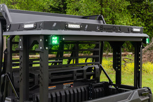 Two Heise 3 inch Green Cube lights installed on back of UTV with Swamp Ox Bed Rack. 